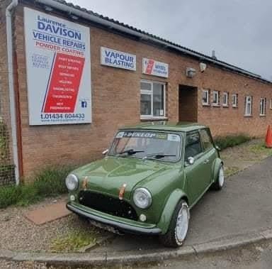 The workshop frontage with its powder coating and vapour blasting signs